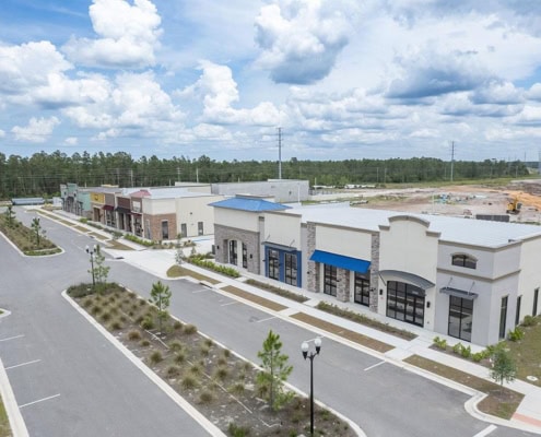 Modern commercial retail stores in a new shopping center development.