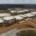 Modern educational facility under construction with multiple buildings, sports fields, and parking areas, showcasing Site Development by SDC for efficient campus planning and infrastructure.