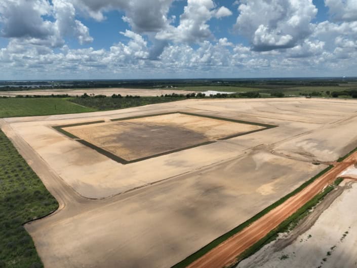 Large undeveloped land plot for site development and construction planning.