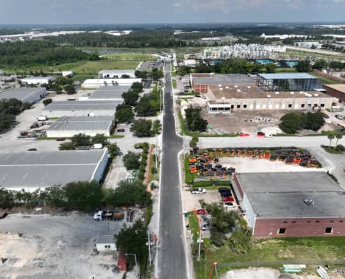 Modern industrial and commercial site development with ongoing construction and infrastructure improvements.