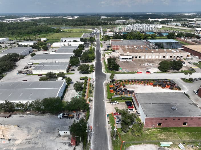 Modern industrial and commercial site development with ongoing construction and infrastructure improvements.