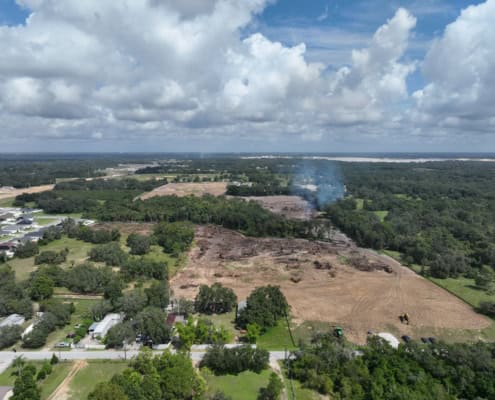 Excavation site during land development process for new construction project.