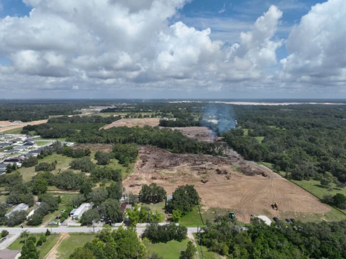 Excavation site during land development process for new construction project.