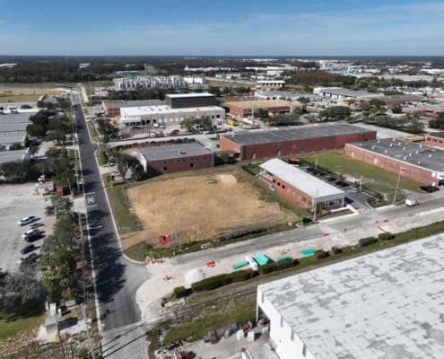 Modern commercial site development in Florida with new construction, infrastructure, and urban planning, emphasizing property development and site planning expertise.