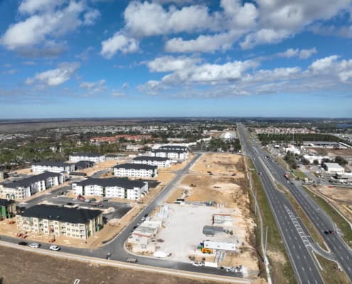 Newly developed residential buildings and infrastructure in Florida, showcasing site development processes, construction progress, and urban planning efforts.