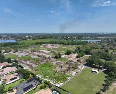 Empty lot demolition and site preparation for new construction, commercial development, or real estate projects.