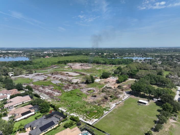 Empty lot demolition and site preparation for new construction, commercial development, or real estate projects.