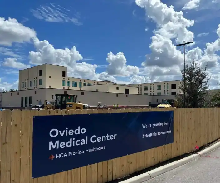 Modern healthcare facility under construction at Oviedo Medical Center, highlighting site development and medical infrastructure.