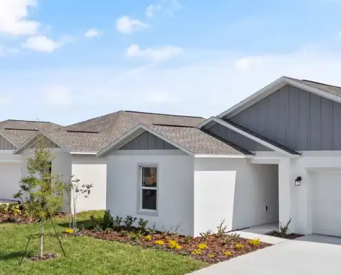 Modern new home with contemporary architecture and landscaped yard, showcasing professional site development services from SDC Site Development.