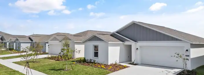 Modern new home with contemporary architecture and landscaped yard, showcasing professional site development services from SDC Site Development.