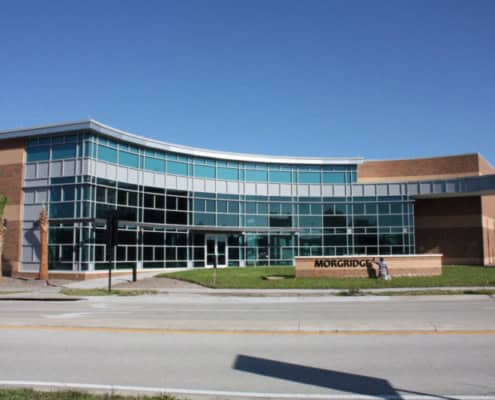 Modern commercial office building with extensive glass façade for site development projects in Florida.