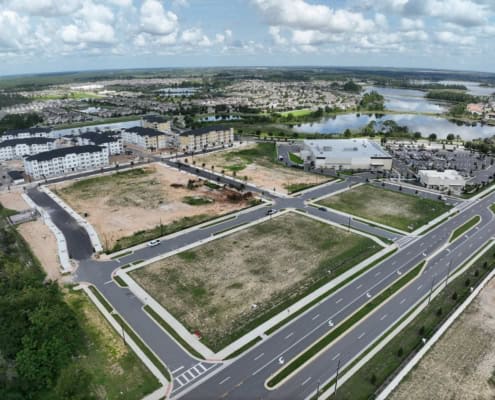 Vacant commercial development lots in a newly planned retail and residential community in Florida.