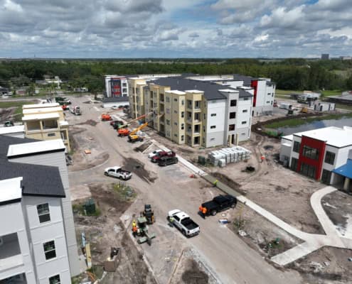 Modern residential apartment construction site with ongoing building and development, showcasing innovative site development for urban living.