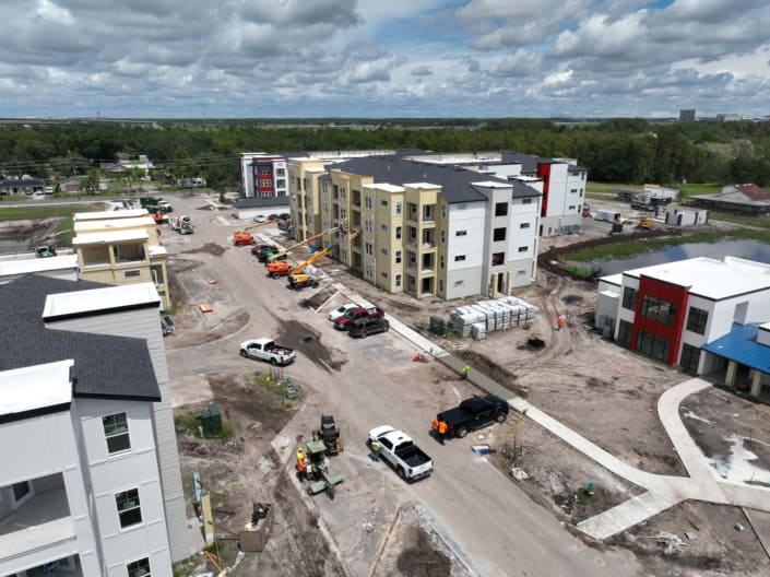 Modern residential apartment construction site with ongoing building and development, showcasing innovative site development for urban living.