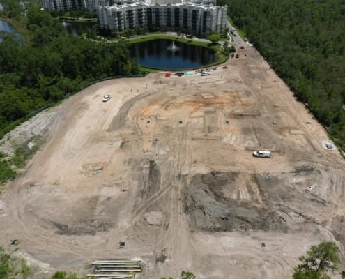 Excavation site for new residential development by SD Construction, showcasing land clearing and foundation preparation for future housing community.
