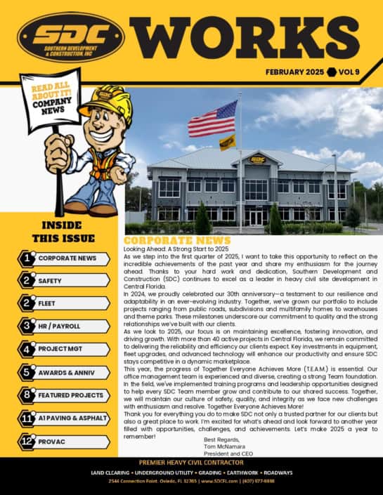 Modern commercial construction site in Central Florida with SDC branding, American flag, and professional office building.